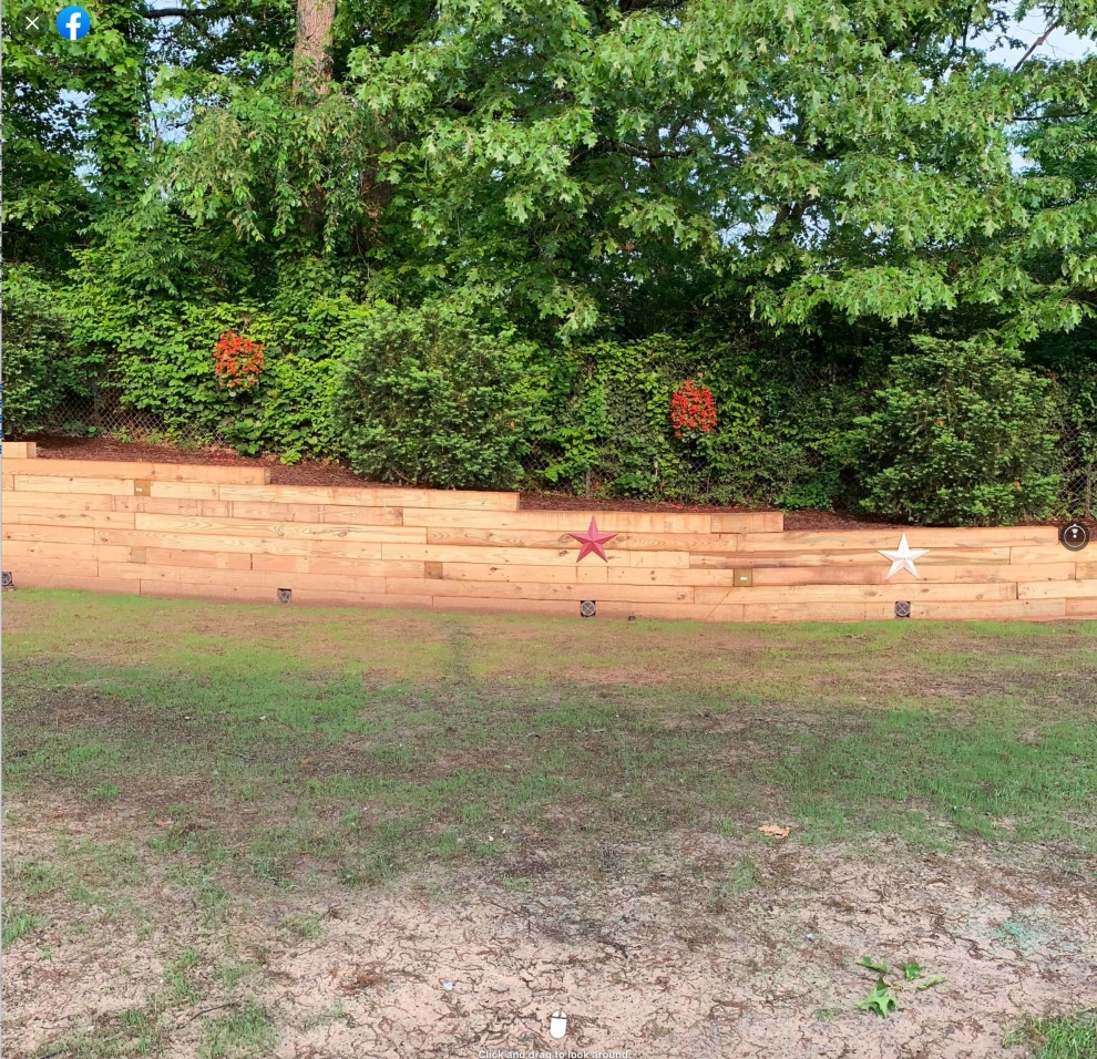 Reclaiming Back Yard with Large Retaining Wall by A+ Equipment Services And Excavation - Photo 7