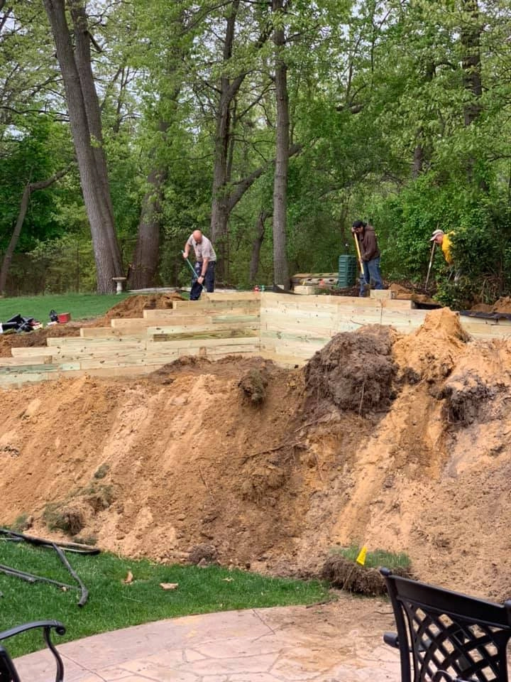 Reclaiming Back Yard with Large Retaining Wall by A+ Equipment Services And Excavation - Photo 5