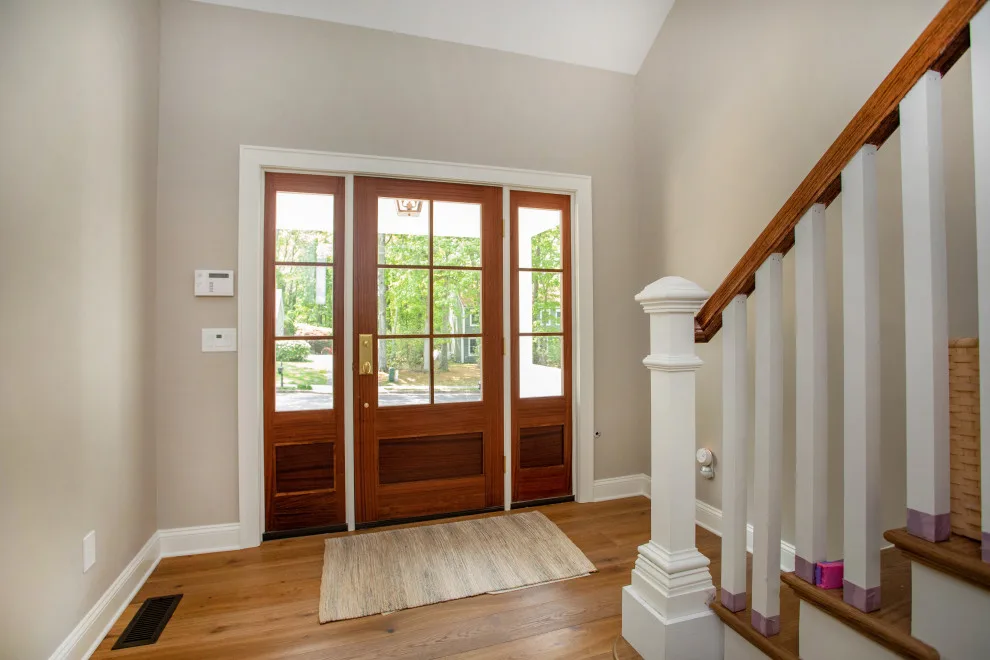 Inviting Exterior and Spacious Living Area by Baine Contracting, Inc. - Photo 25