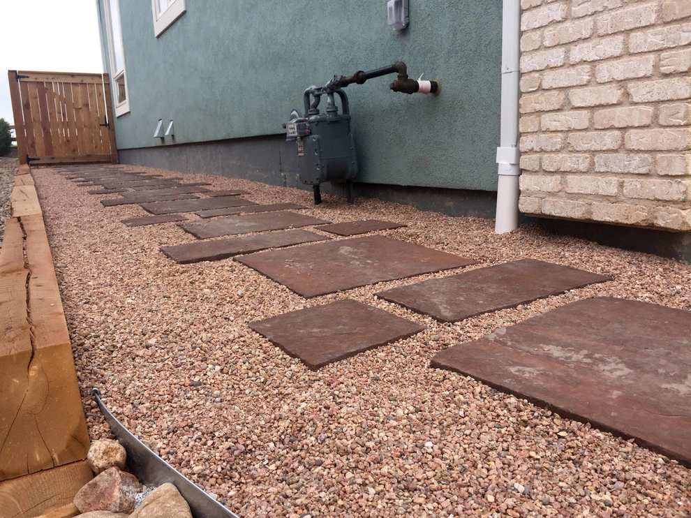 Windsor Lake landscape, paver path, and pond installation by All Terrain Landscaping - Photo 3