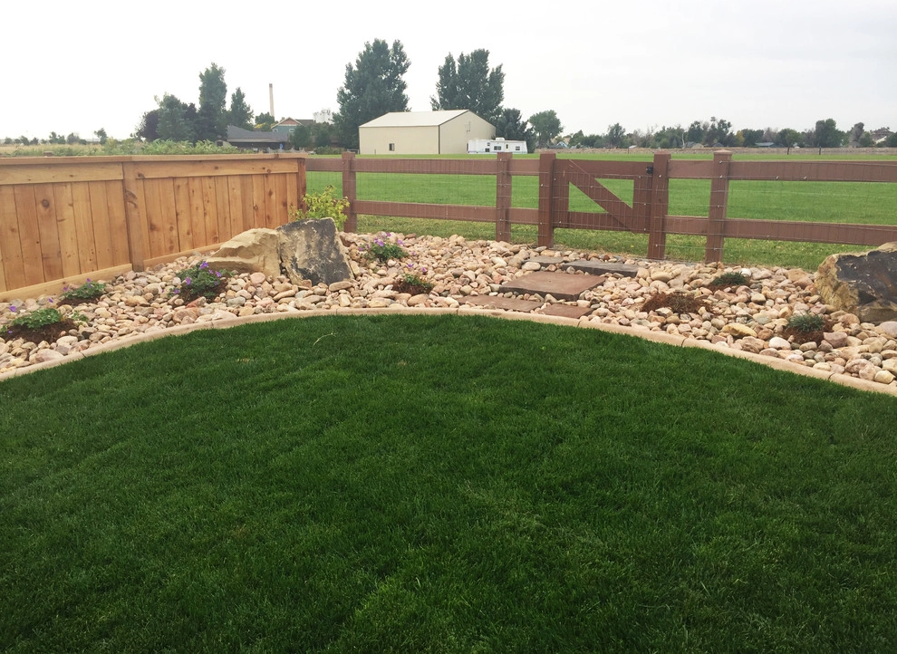 Windsor Lake landscape, paver path, and pond installation by All Terrain Landscaping - Photo 6