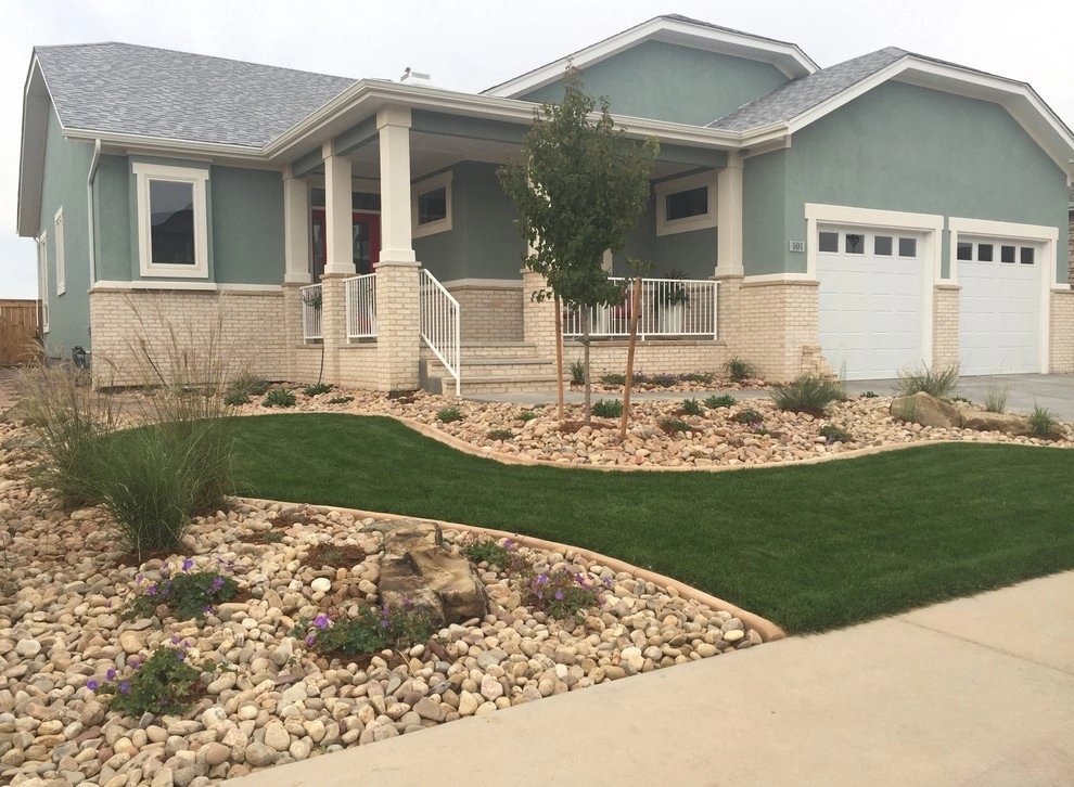 Windsor Lake landscape, paver path, and pond installation by All Terrain Landscaping - Photo 5