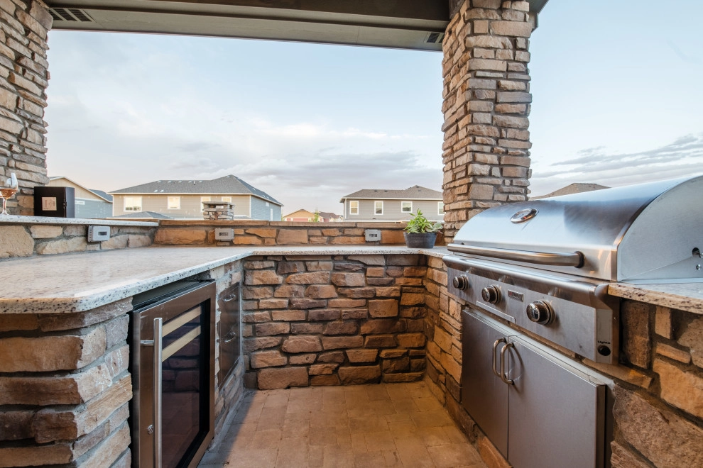 Stone Fireplace Wall and Outdoor Kitchen by All Terrain Landscaping - Photo 7