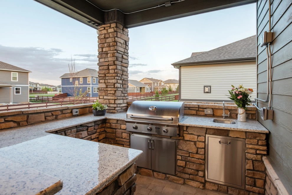 Stone Fireplace Wall and Outdoor Kitchen by All Terrain Landscaping - Photo 10