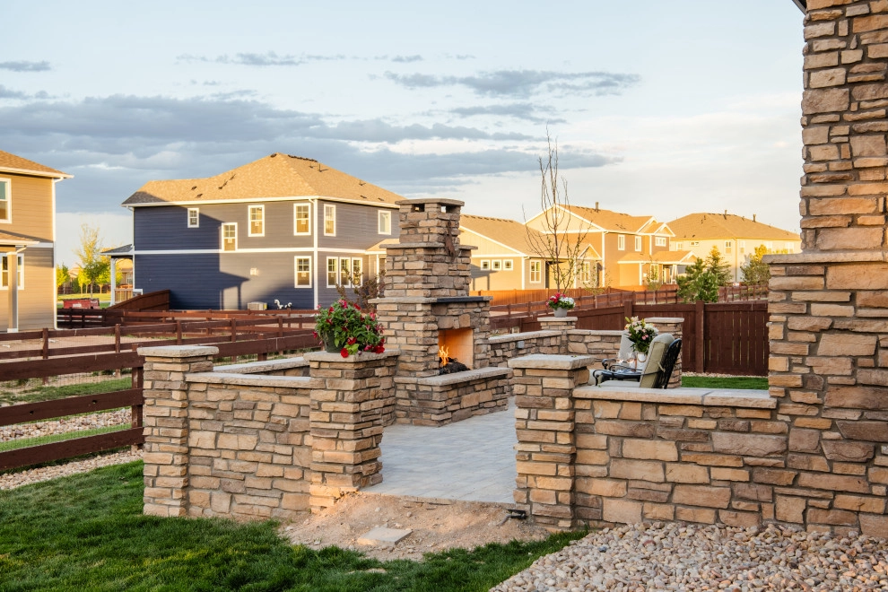 Stone Fireplace Wall and Outdoor Kitchen by All Terrain Landscaping - Photo 11