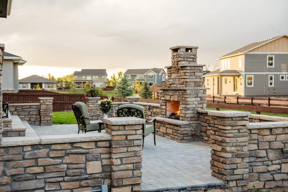 Stone Fireplace Wall and Outdoor Kitchen by All Terrain Landscaping - Photo 4