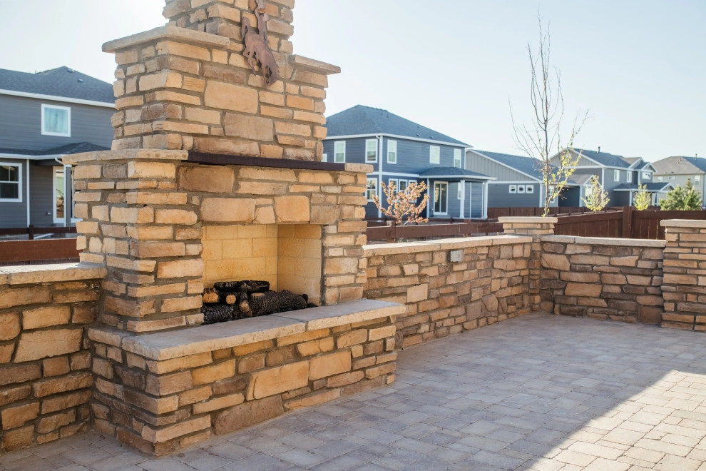 Stone Fireplace Wall and Outdoor Kitchen by All Terrain Landscaping - Photo 3