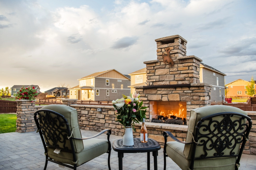 Stone Fireplace Wall and Outdoor Kitchen by All Terrain Landscaping - Photo 8
