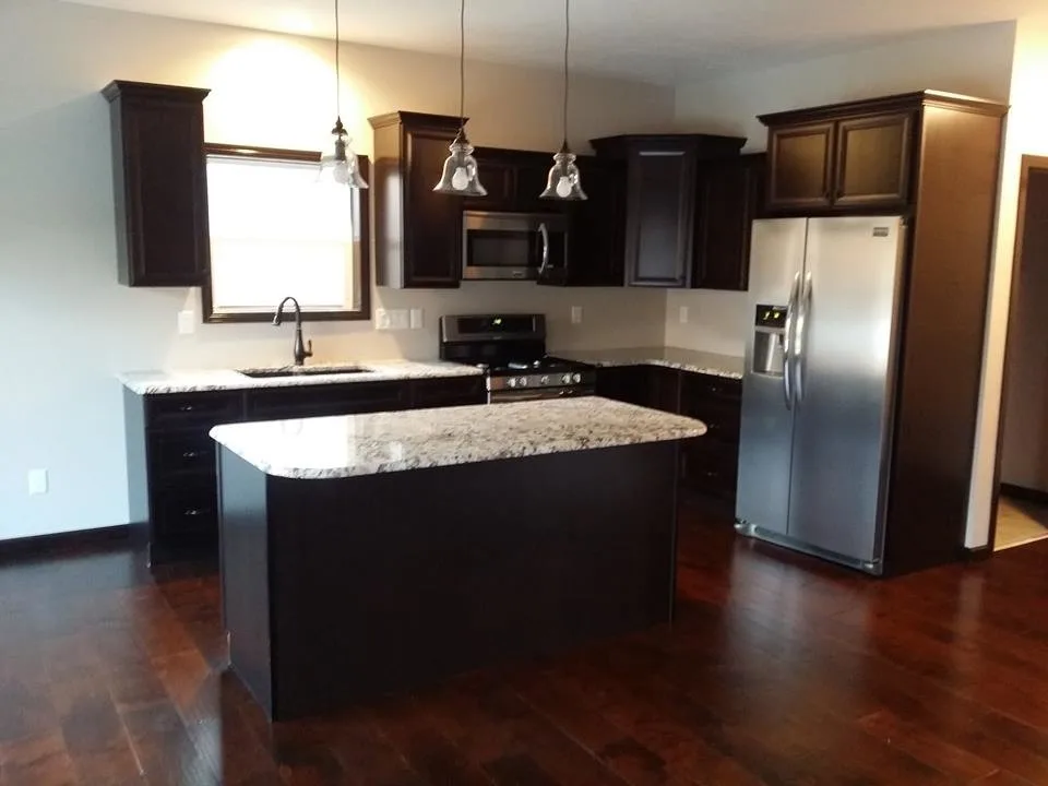 Kitchen Island Inspirations by Wausau Homes Manistique - Photo 11
