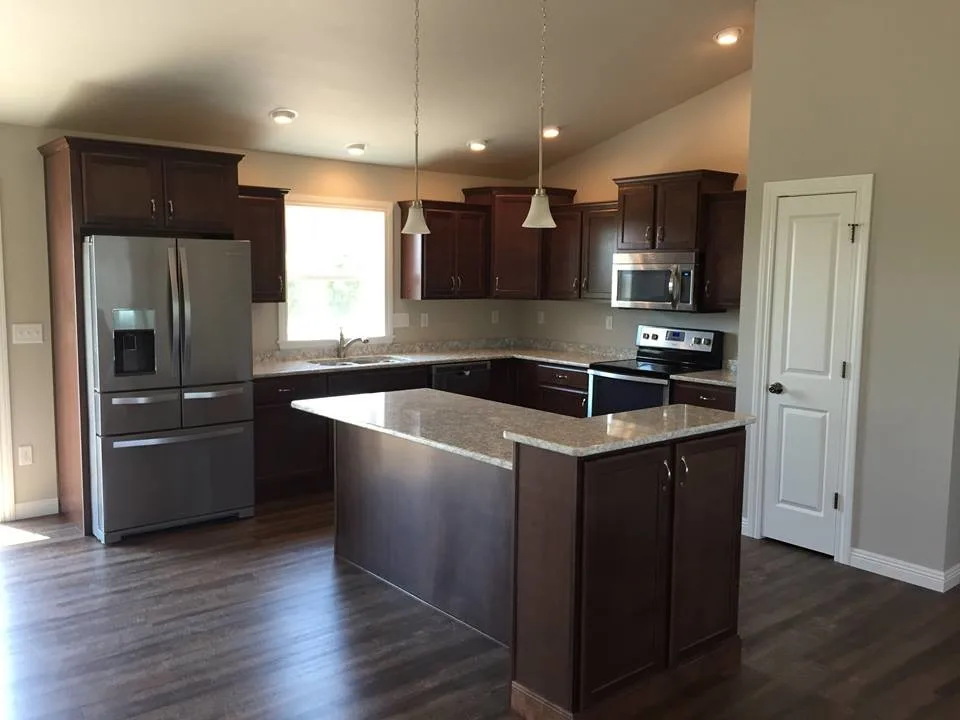 Kitchen Island Inspirations by Wausau Homes Manistique - Photo 17