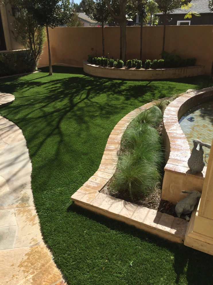 Studio City Residence - Front Yard Landscaping, stonework, and turf by Allstate Landscape & Southwest Greens - Photo 3
