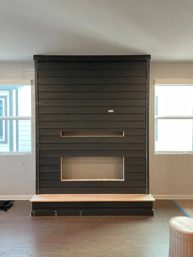Fireplace and Staircase with New Flooring by Austin Dream Remodeling - Photo 12