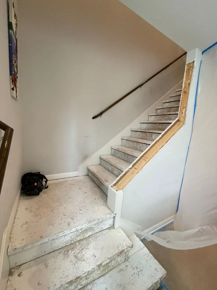 Fireplace and Staircase with New Flooring by Austin Dream Remodeling - Photo 3