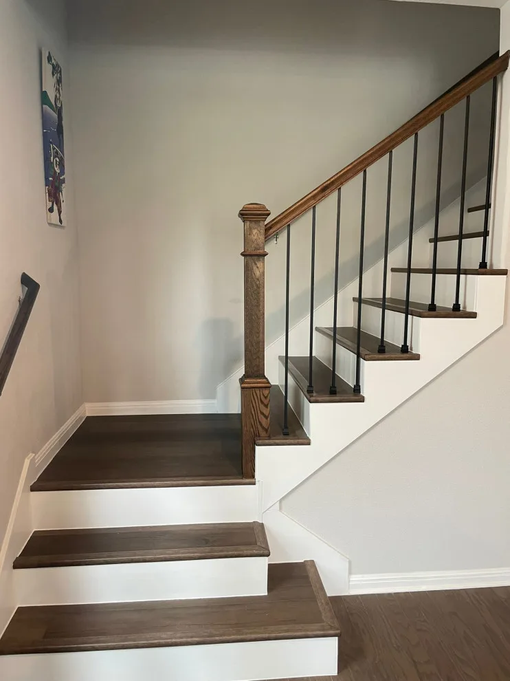 Fireplace and Staircase with New Flooring by Austin Dream Remodeling - Photo 6