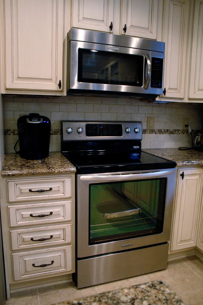 Shelby Township Culinary and Living Space by Kopke Remodeling & Design - Photo 16