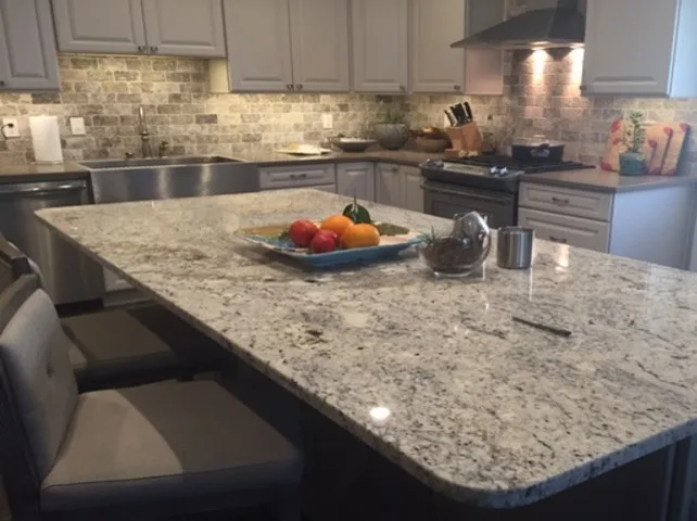 Ginger Quartz and White Ice Granite Countertop by North Lion Stone - Photo 11