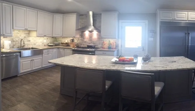Ginger Quartz and White Ice Granite Countertop by North Lion Stone - Photo 9