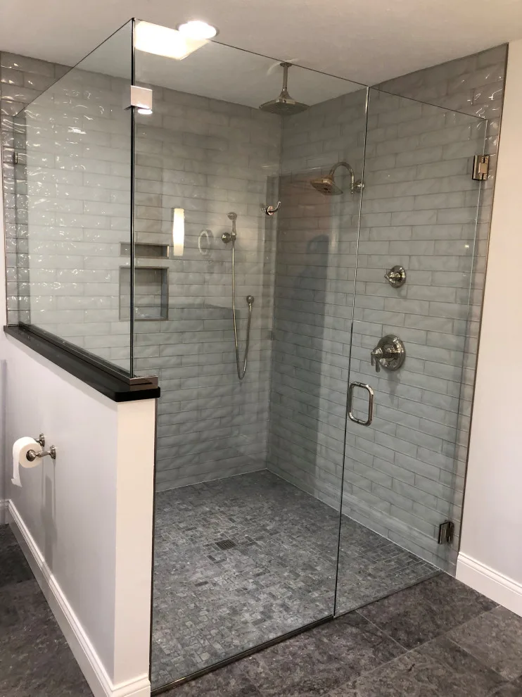 Shower with glass and tile by HM Remodeling - Photo 2