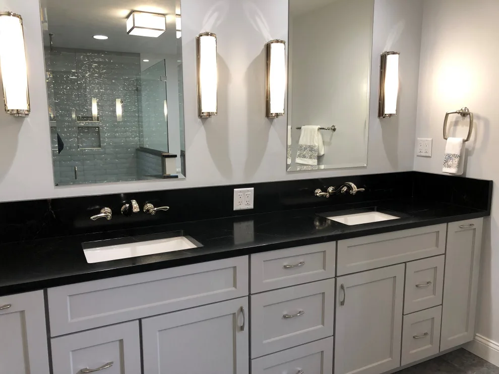 Shower with glass and tile by HM Remodeling - Photo 3