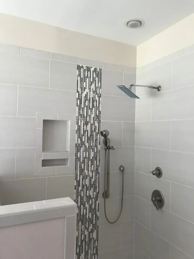 Shower Project with Gray Tile Design by Northshore Renovations - Photo 3