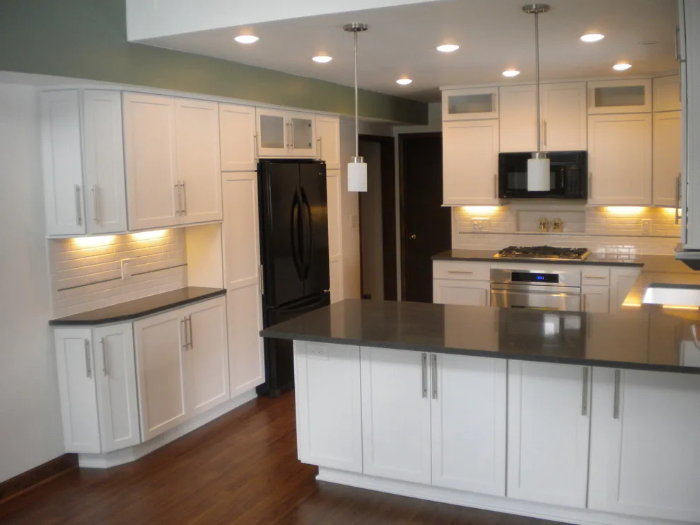 Contemporary Kitchen Renovation in Greendale Featuring White Cabinets by Advantage Design + Remodel - Photo 2