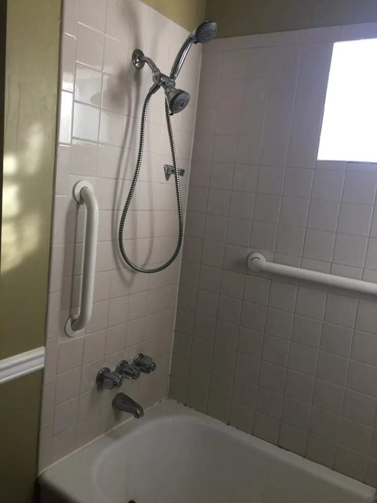 Bathroom with Window in Hall by Spencer Remodeling - Photo 2