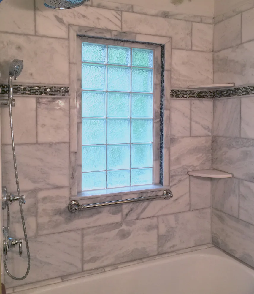 Bathroom with Window in Hall by Spencer Remodeling - Photo 5