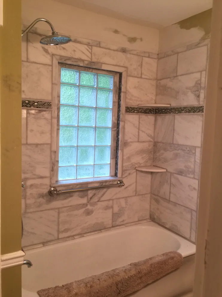 Bathroom with Window in Hall by Spencer Remodeling - Photo 7