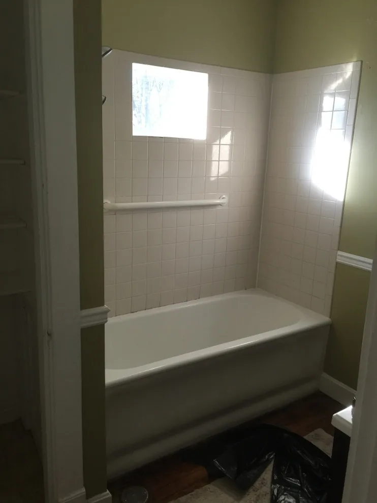 Bathroom with Window in Hall by Spencer Remodeling - Photo 14
