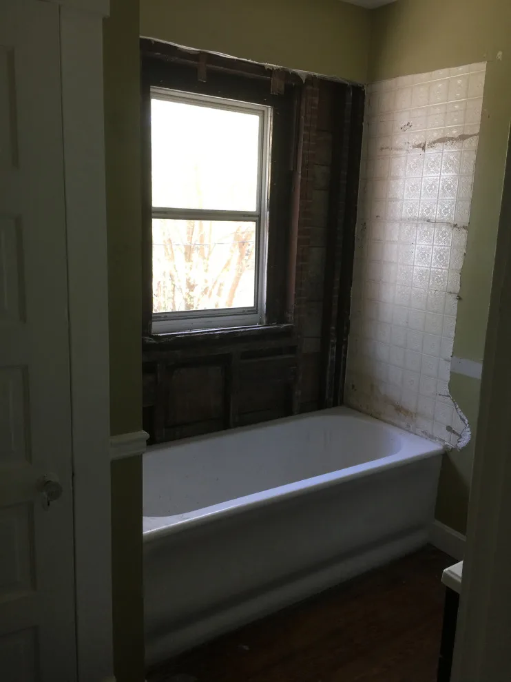 Bathroom with Window in Hall by Spencer Remodeling - Photo 13