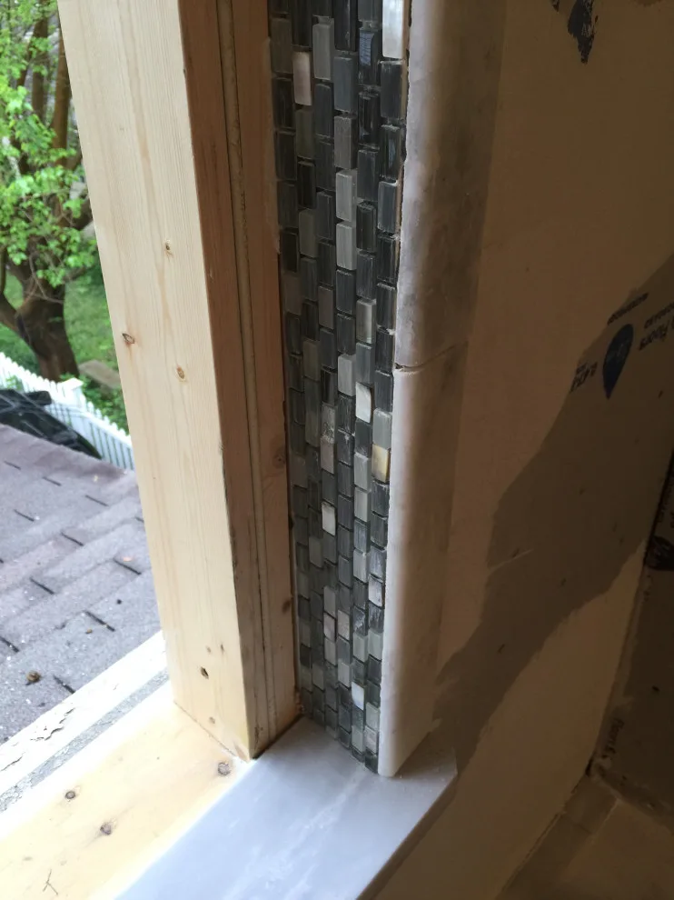 Bathroom with Window in Hall by Spencer Remodeling - Photo 18