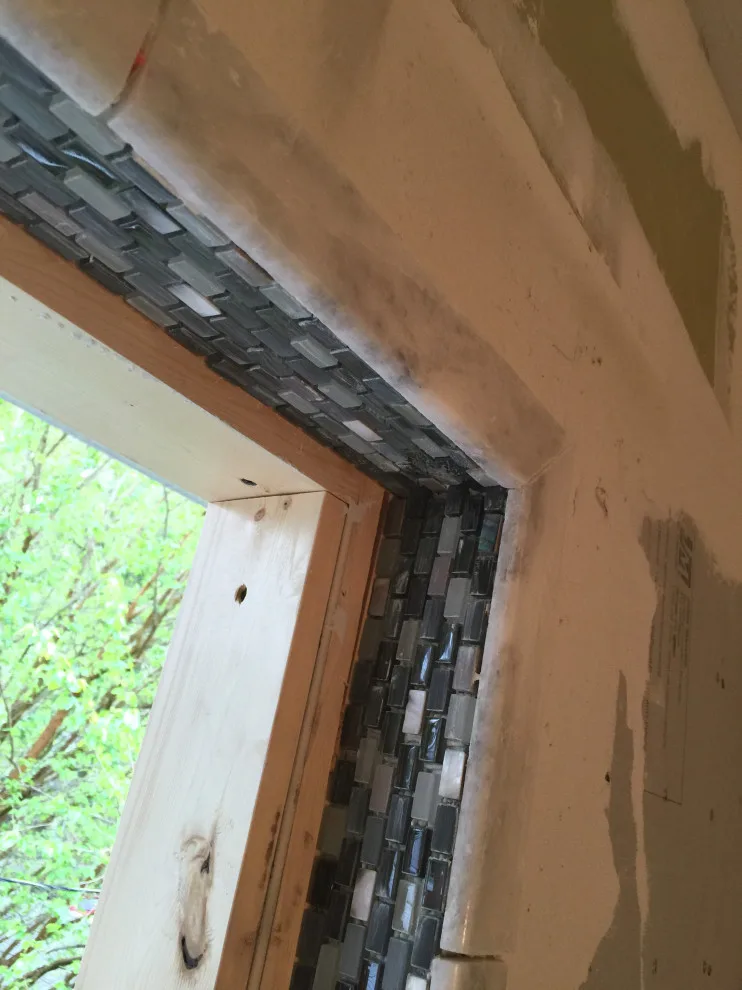 Bathroom with Window in Hall by Spencer Remodeling - Photo 9