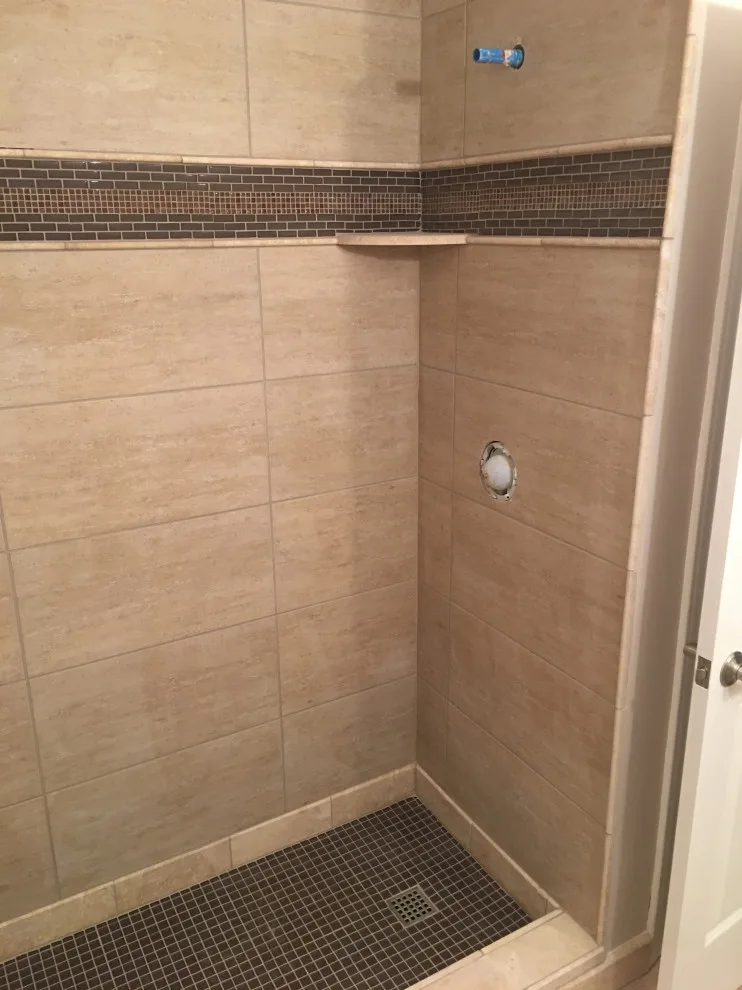 Bathroom in the Hallway by Spencer Remodeling - Photo 11