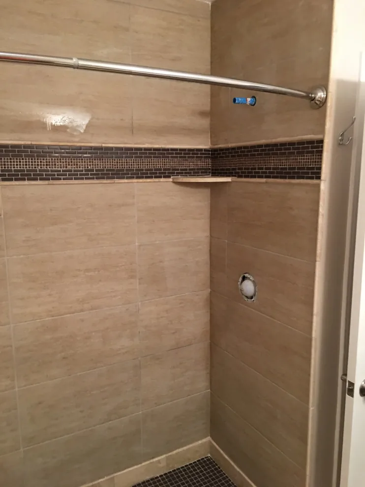 Bathroom in the Hallway by Spencer Remodeling - Photo 8