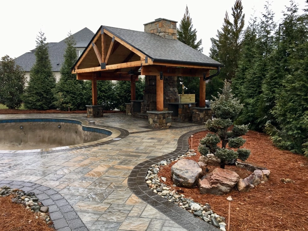 Covered outdoor living around pool by Ayers Hardscapes & Landscapes LLC - Photo 4