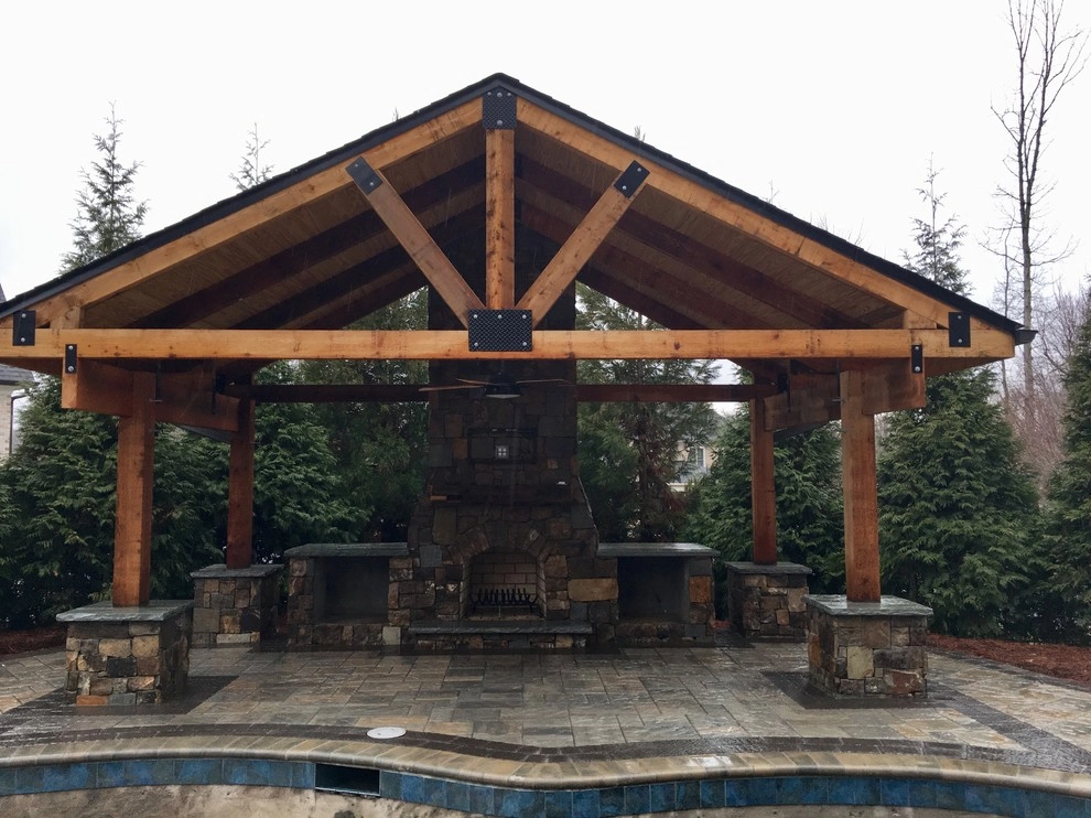 Covered outdoor living around pool by Ayers Hardscapes & Landscapes LLC - Photo 2