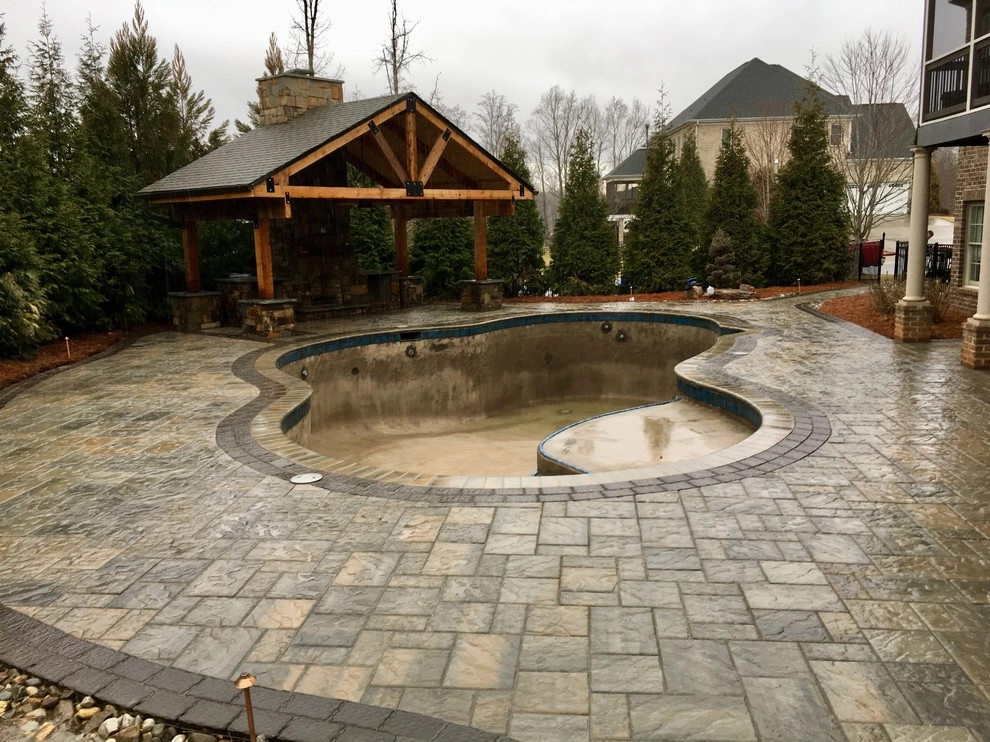 Covered outdoor living around pool by Ayers Hardscapes & Landscapes LLC - Photo 3