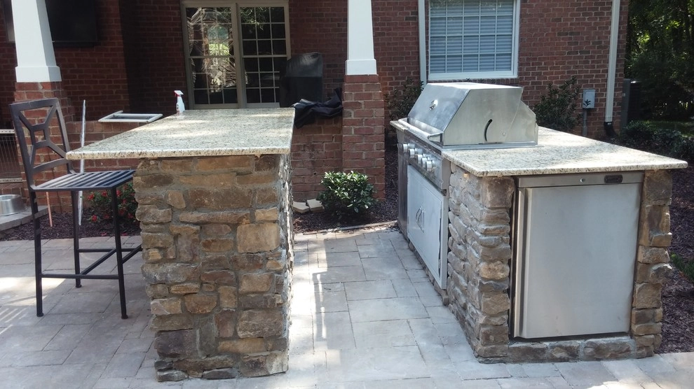 Outdoor Fireplace with grill island and bar by Ayers Hardscapes & Landscapes LLC - Photo 18