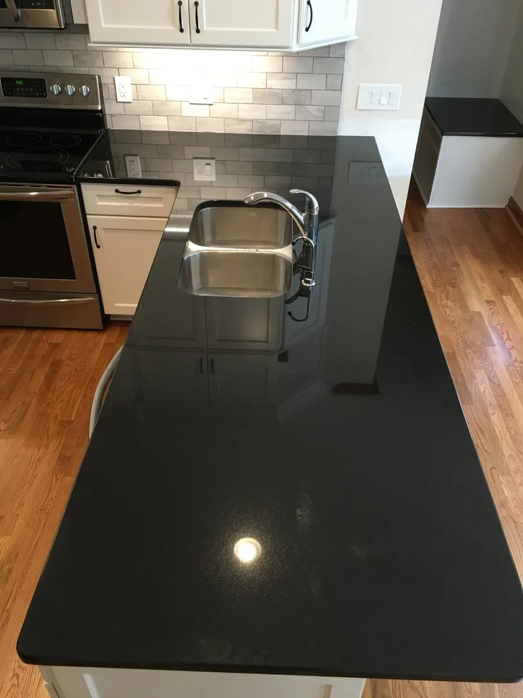Monochrome Marietta Kitchen with Black Granite by Custom Professional Remodeling, Inc - Photo 3
