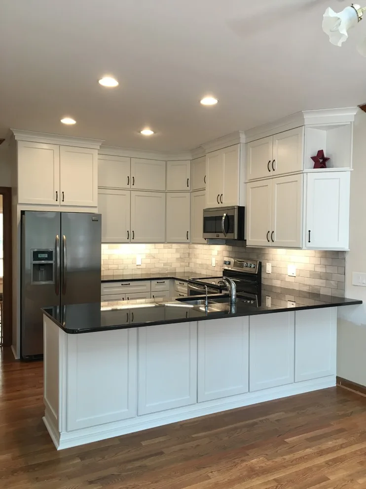 Monochrome Marietta Kitchen with Black Granite by Custom Professional Remodeling, Inc - Photo 4
