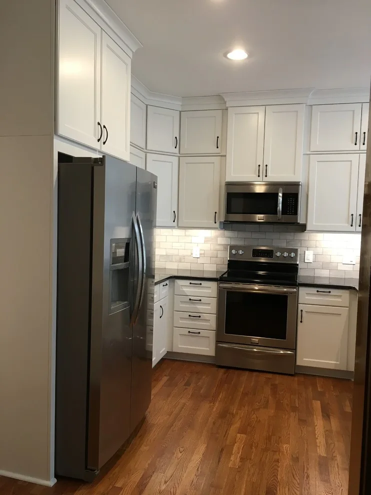 Monochrome Marietta Kitchen with Black Granite by Custom Professional Remodeling, Inc - Photo 6