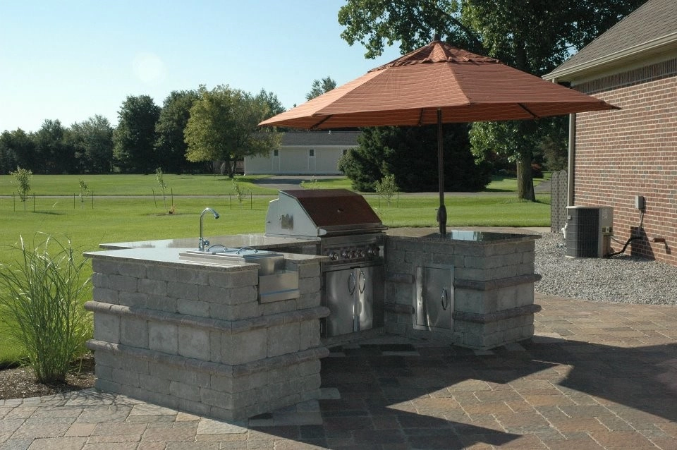 Outdoor kitchen and patio by Barkman Landscaping INC - Photo 2