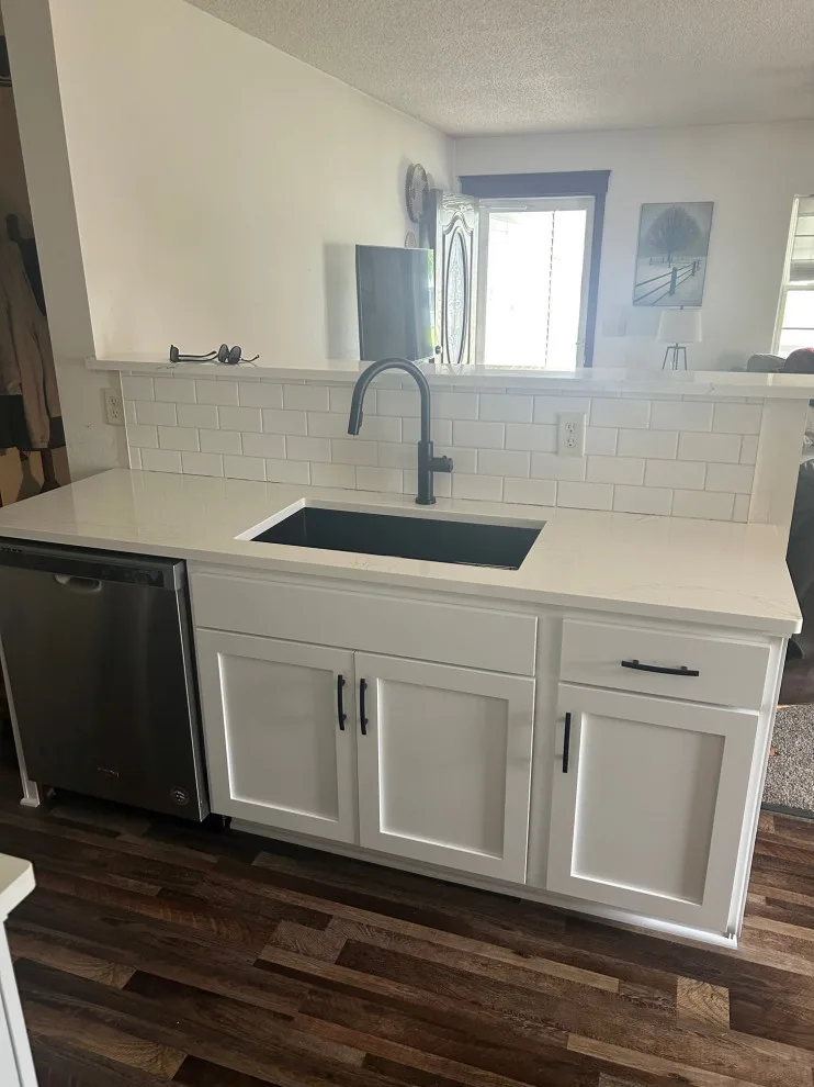 Kitchen Renovation with White Refaced Cabinets and Quartz Countertops by Kitchen Solvers Of Eau Claire - Photo 2