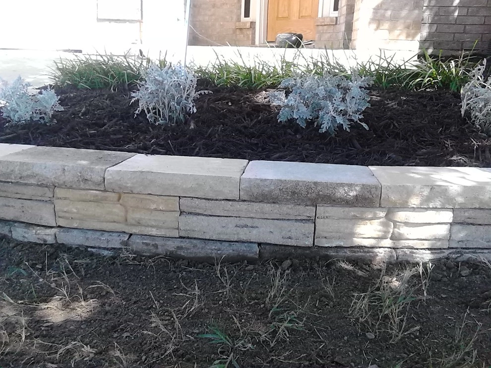 Pavestone Retaining Wall by Be Green Texas Lawn Care - Photo 4