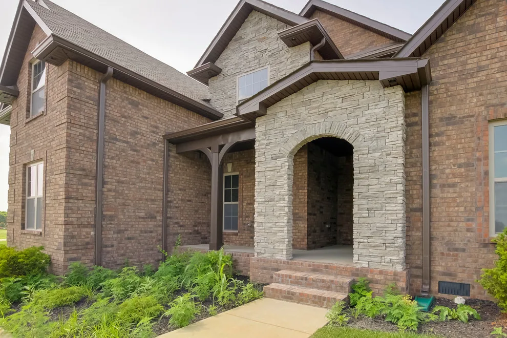 Two-Story Brick and Stone Home with Community Features by Crabbe Homes - Photo 5