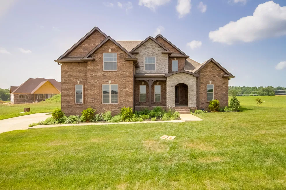 Two-Story Brick and Stone Home with Community Features by Crabbe Homes - Photo 7