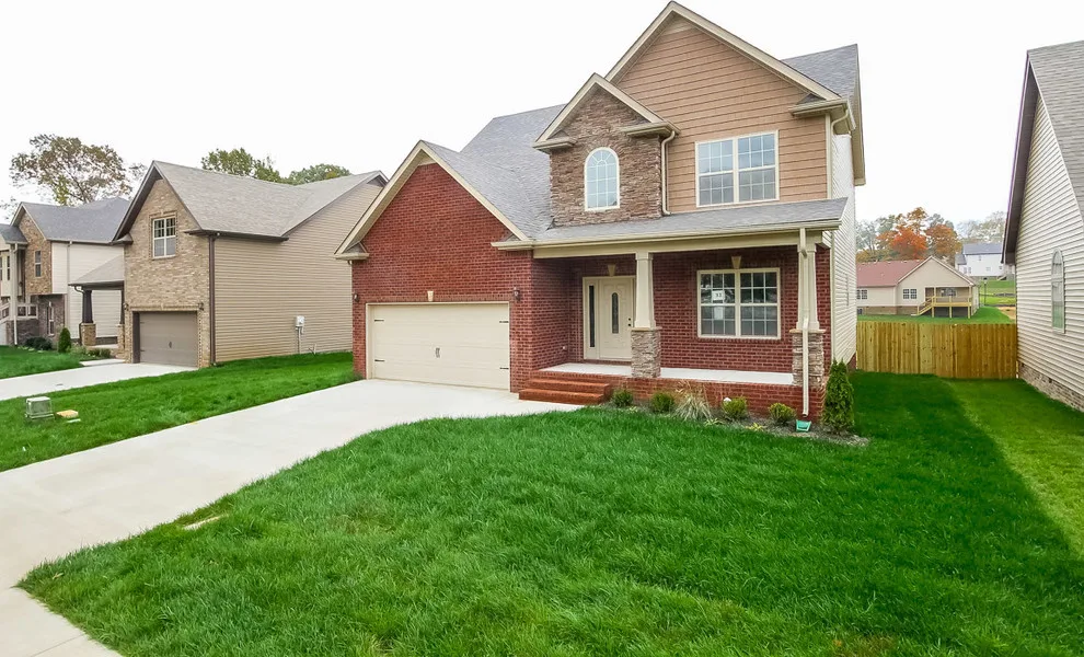 New Community Brick Front Residence by Crabbe Homes - Photo 2