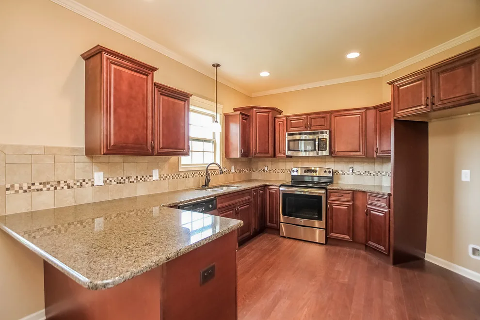 New Community Brick Front Residence by Crabbe Homes - Photo 5