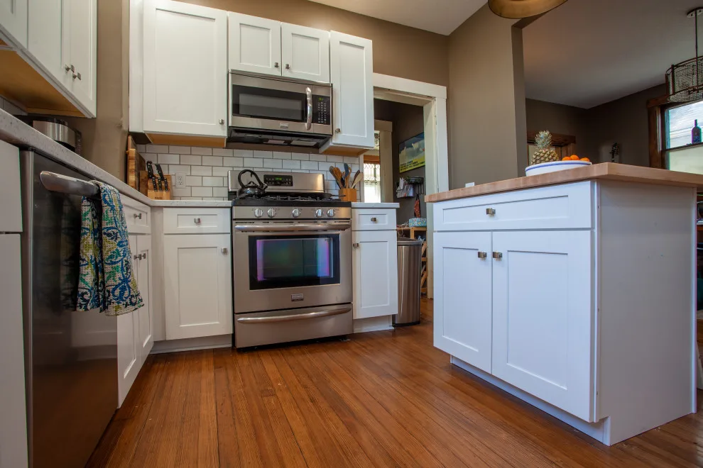 Welcoming and Warm Kitchen by Miracle Contracting Inc. - Photo 2