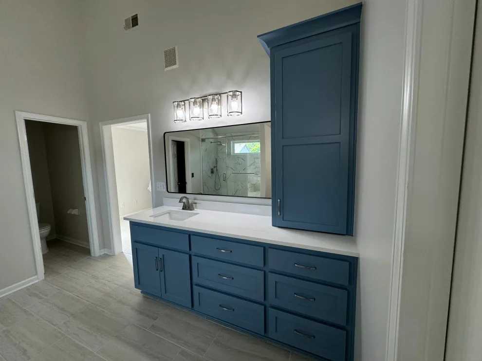 Radiant and Stylish Bathroom Renovation by Reliance Construction Group - Photo 3